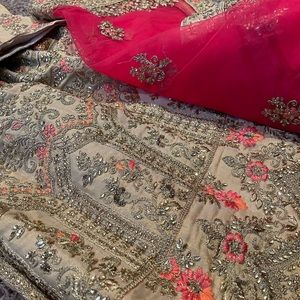 Heavy party wear Lehenga Choli with Dupatta. Very pretty.